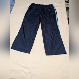 R&R Navy Blue Tear Away  Pants with Light Blue Stripe. Snaps Down Both Sides. .